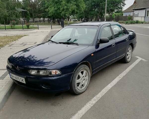 Синий Мицубиси Галант, объемом двигателя 1.8 л и пробегом 236 тыс. км за 2500 $, фото 1 на Automoto.ua