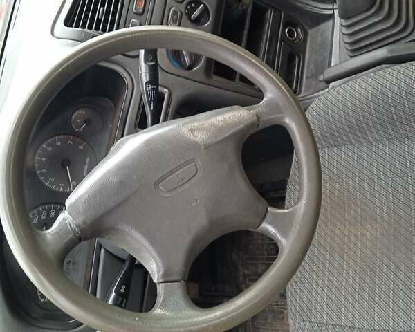 Синий Мицубиси Галант, объемом двигателя 2 л и пробегом 111 тыс. км за 700 $, фото 2 на Automoto.ua