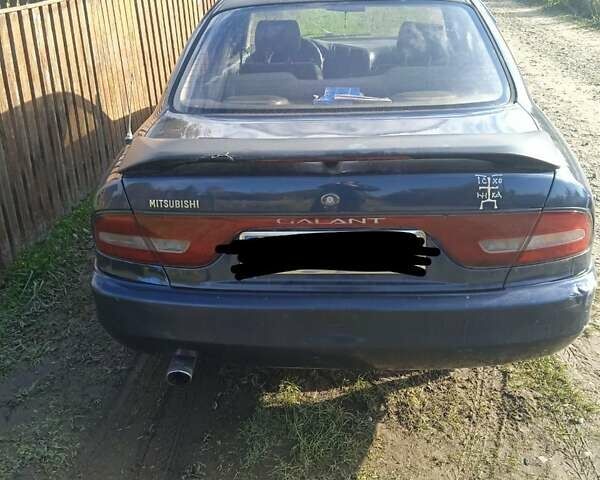 Синий Мицубиси Галант, объемом двигателя 2 л и пробегом 111 тыс. км за 700 $, фото 5 на Automoto.ua