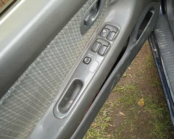 Синий Мицубиси Галант, объемом двигателя 2 л и пробегом 111 тыс. км за 700 $, фото 4 на Automoto.ua