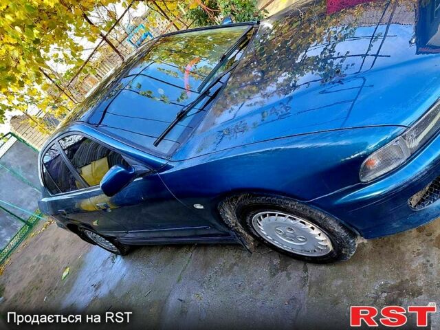 Синий Мицубиси Галант, объемом двигателя 2.5 л и пробегом 350 тыс. км за 2500 $, фото 2 на Automoto.ua
