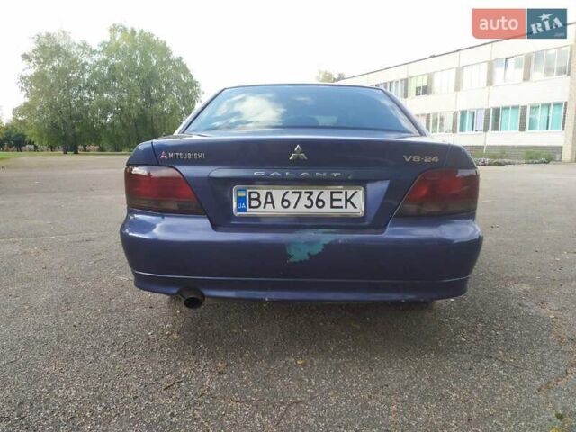 Синий Мицубиси Галант, объемом двигателя 2.5 л и пробегом 300 тыс. км за 3700 $, фото 2 на Automoto.ua