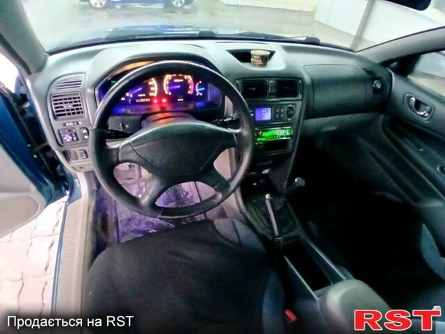 Синий Мицубиси Галант, объемом двигателя 2 л и пробегом 200 тыс. км за 2499 $, фото 5 на Automoto.ua