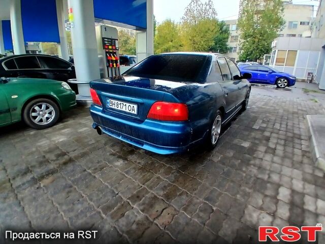 Синий Мицубиси Галант, объемом двигателя 2 л и пробегом 200 тыс. км за 2499 $, фото 4 на Automoto.ua