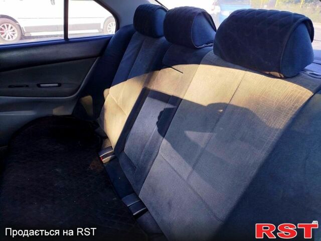 Синий Мицубиси Галант, объемом двигателя 2 л и пробегом 295 тыс. км за 2700 $, фото 4 на Automoto.ua