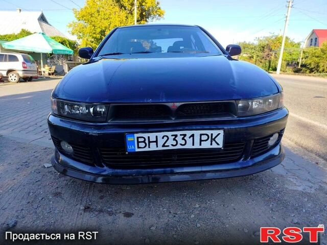 Синий Мицубиси Галант, объемом двигателя 2 л и пробегом 295 тыс. км за 2700 $, фото 5 на Automoto.ua