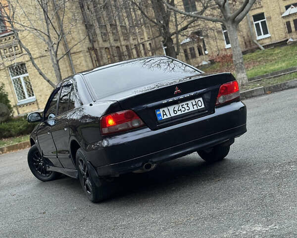 Синий Мицубиси Галант, объемом двигателя 2 л и пробегом 300 тыс. км за 3499 $, фото 5 на Automoto.ua