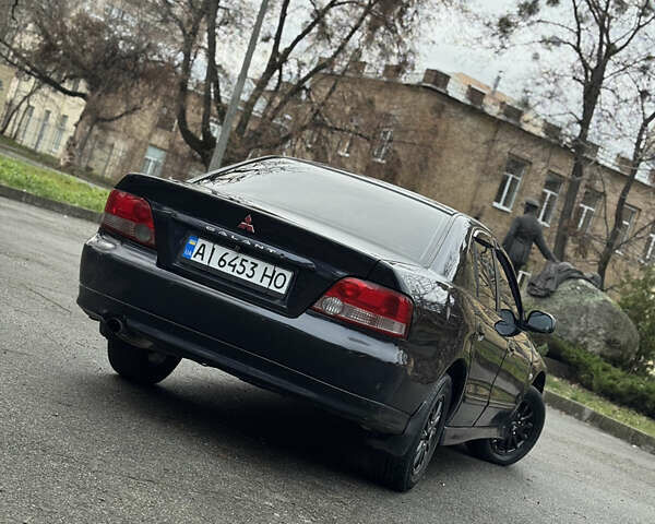 Синий Мицубиси Галант, объемом двигателя 2 л и пробегом 300 тыс. км за 3499 $, фото 8 на Automoto.ua