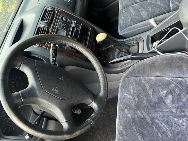 Синий Мицубиси Галант, объемом двигателя 2.5 л и пробегом 321 тыс. км за 1700 $, фото 6 на Automoto.ua