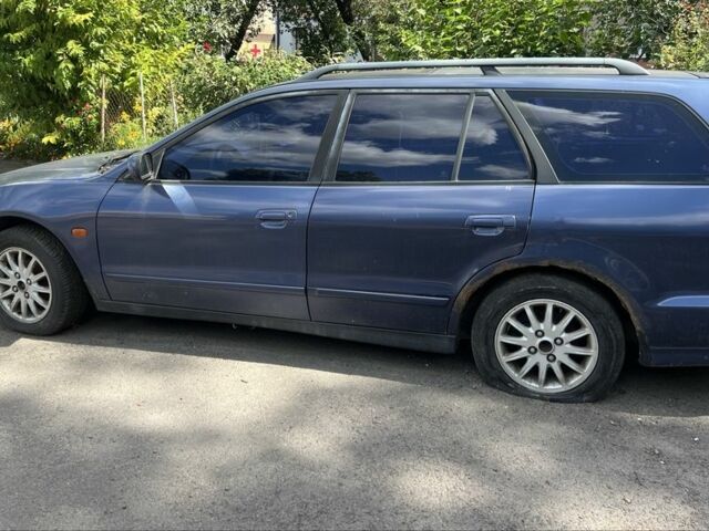 Синий Мицубиси Галант, объемом двигателя 2.5 л и пробегом 321 тыс. км за 1700 $, фото 4 на Automoto.ua