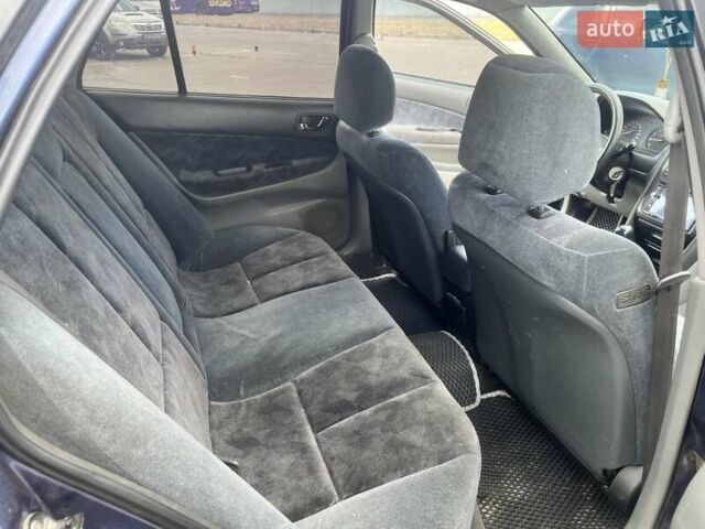 Синий Мицубиси Галант, объемом двигателя 2 л и пробегом 317 тыс. км за 2994 $, фото 11 на Automoto.ua