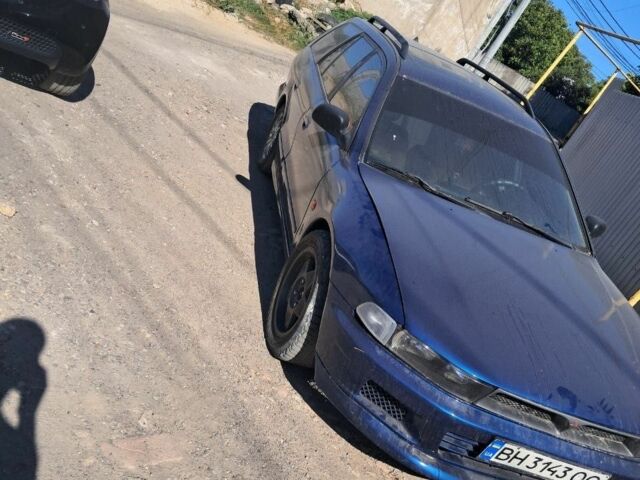 Синий Мицубиси Галант, объемом двигателя 2.5 л и пробегом 2 тыс. км за 1909 $, фото 1 на Automoto.ua