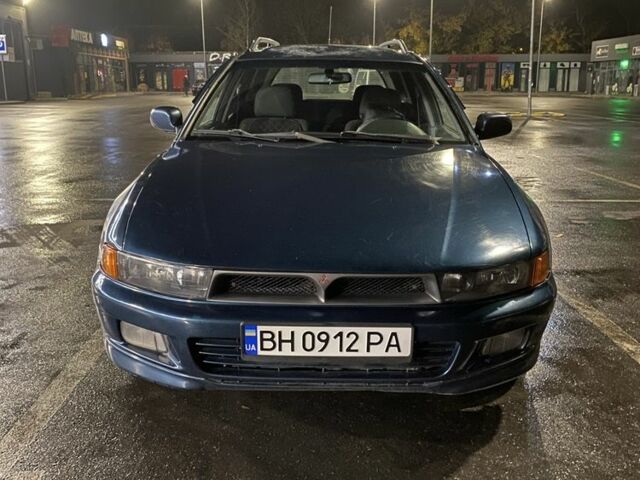 Синий Мицубиси Галант, объемом двигателя 2 л и пробегом 318 тыс. км за 2750 $, фото 1 на Automoto.ua