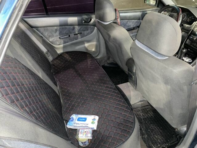 Синий Мицубиси Галант, объемом двигателя 2 л и пробегом 318 тыс. км за 2750 $, фото 5 на Automoto.ua