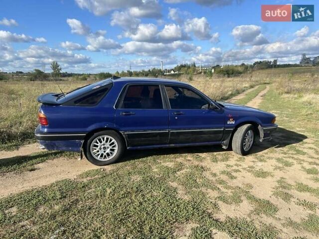 Синий Мицубиси Галант, объемом двигателя 2 л и пробегом 310 тыс. км за 1800 $, фото 5 на Automoto.ua