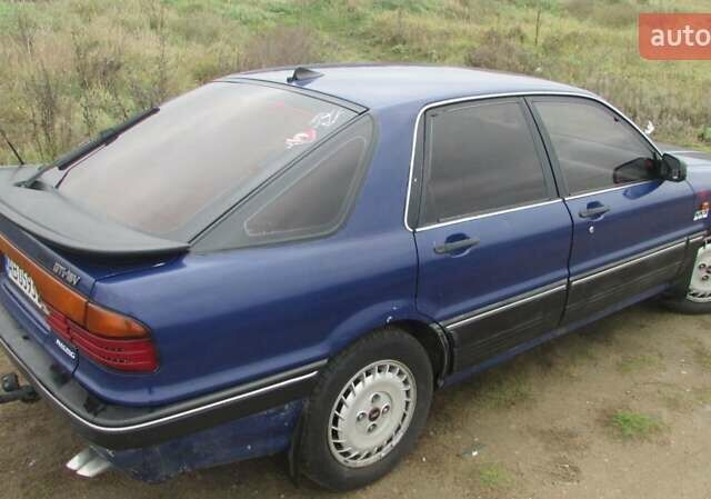 Синий Мицубиси Галант, объемом двигателя 2 л и пробегом 310 тыс. км за 1400 $, фото 1 на Automoto.ua