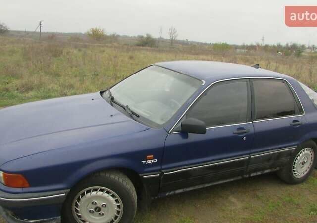 Синий Мицубиси Галант, объемом двигателя 2 л и пробегом 310 тыс. км за 1500 $, фото 1 на Automoto.ua