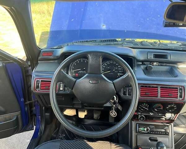 Синий Мицубиси Галант, объемом двигателя 2 л и пробегом 310 тыс. км за 1400 $, фото 2 на Automoto.ua