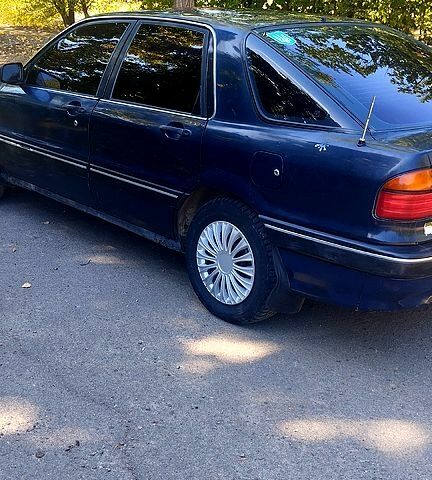 Синий Мицубиси Галант, объемом двигателя 2 л и пробегом 250 тыс. км за 650 $, фото 6 на Automoto.ua