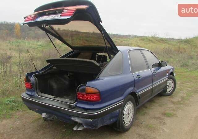 Синий Мицубиси Галант, объемом двигателя 2 л и пробегом 310 тыс. км за 1500 $, фото 2 на Automoto.ua