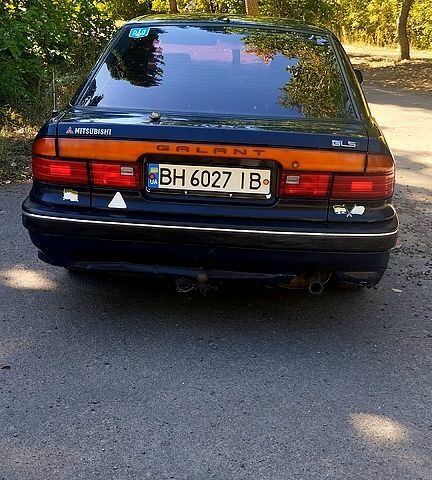 Синий Мицубиси Галант, объемом двигателя 2 л и пробегом 250 тыс. км за 650 $, фото 4 на Automoto.ua