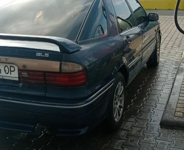 Синий Мицубиси Галант, объемом двигателя 2 л и пробегом 300 тыс. км за 2000 $, фото 2 на Automoto.ua