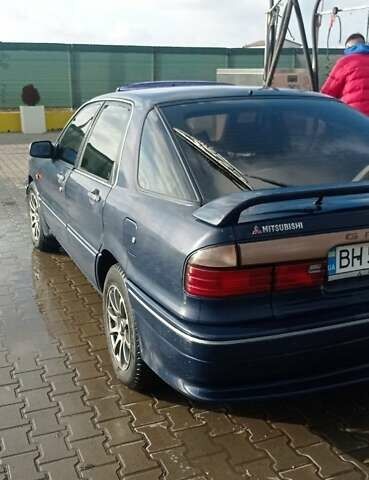 Синий Мицубиси Галант, объемом двигателя 2 л и пробегом 300 тыс. км за 2000 $, фото 5 на Automoto.ua