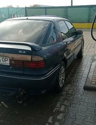 Синий Мицубиси Галант, объемом двигателя 2 л и пробегом 300 тыс. км за 2000 $, фото 1 на Automoto.ua