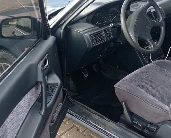 Синий Мицубиси Галант, объемом двигателя 2 л и пробегом 300 тыс. км за 2000 $, фото 4 на Automoto.ua