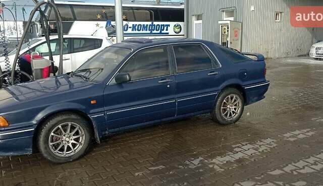 Синий Мицубиси Галант, объемом двигателя 2 л и пробегом 300 тыс. км за 2000 $, фото 6 на Automoto.ua