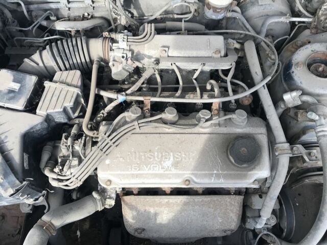 Синий Мицубиси Галант, объемом двигателя 1.8 л и пробегом 220 тыс. км за 750 $, фото 1 на Automoto.ua