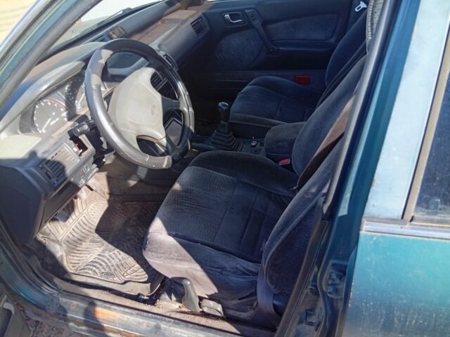 Мицубиси Галант 1992 в Вишневом на Automoto.ua Зеленый Мицубиси Галант, объемом двигателя 2 л и пробегом 169 тыс. км за 725 $, фото 3 на Automoto.ua