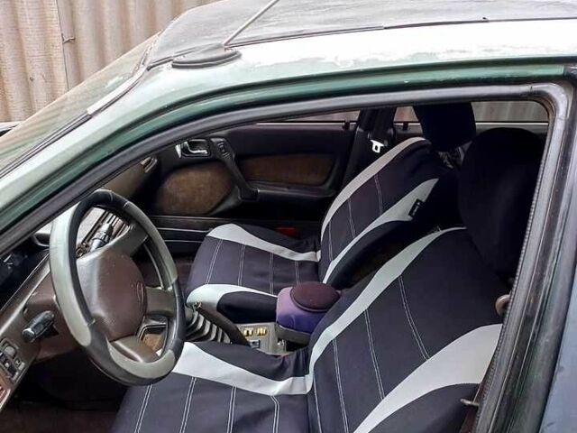 Зелений Міцубісі Галант, об'ємом двигуна 2 л та пробігом 440 тис. км за 1200 $, фото 3 на Automoto.ua