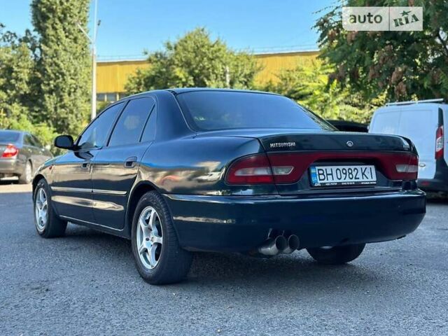 Зеленый Мицубиси Галант, объемом двигателя 1.8 л и пробегом 455 тыс. км за 1999 $, фото 5 на Automoto.ua