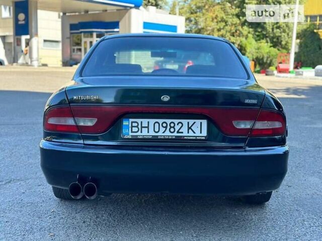 Зеленый Мицубиси Галант, объемом двигателя 1.8 л и пробегом 455 тыс. км за 1999 $, фото 4 на Automoto.ua
