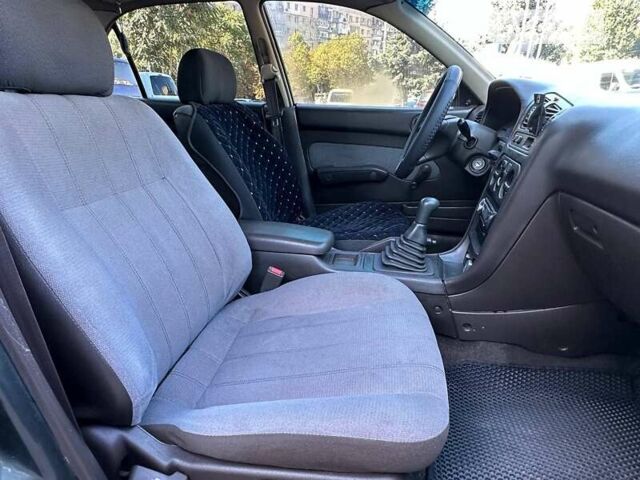 Зеленый Мицубиси Галант, объемом двигателя 1.8 л и пробегом 455 тыс. км за 1999 $, фото 11 на Automoto.ua