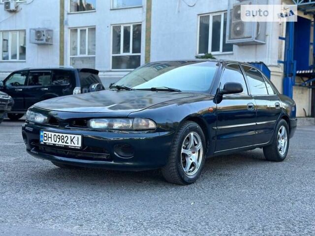 Зеленый Мицубиси Галант, объемом двигателя 1.8 л и пробегом 455 тыс. км за 1999 $, фото 1 на Automoto.ua