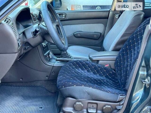 Зеленый Мицубиси Галант, объемом двигателя 1.8 л и пробегом 455 тыс. км за 1999 $, фото 13 на Automoto.ua