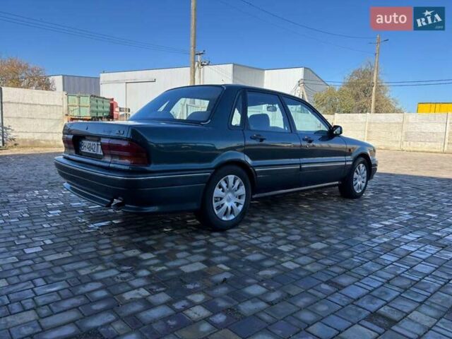 Зеленый Мицубиси Галант, объемом двигателя 1.8 л и пробегом 352 тыс. км за 1900 $, фото 3 на Automoto.ua