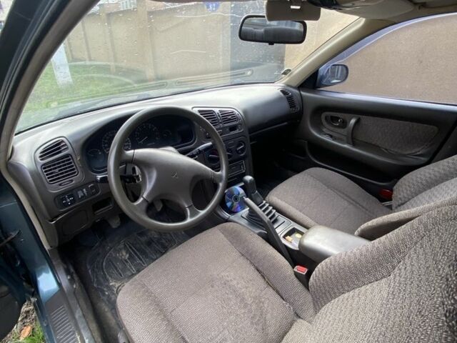 Зеленый Мицубиси Галант, объемом двигателя 2 л и пробегом 380 тыс. км за 1500 $, фото 8 на Automoto.ua