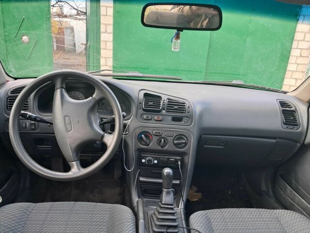 Зеленый Мицубиси Галант, объемом двигателя 2 л и пробегом 280 тыс. км за 1450 $, фото 5 на Automoto.ua