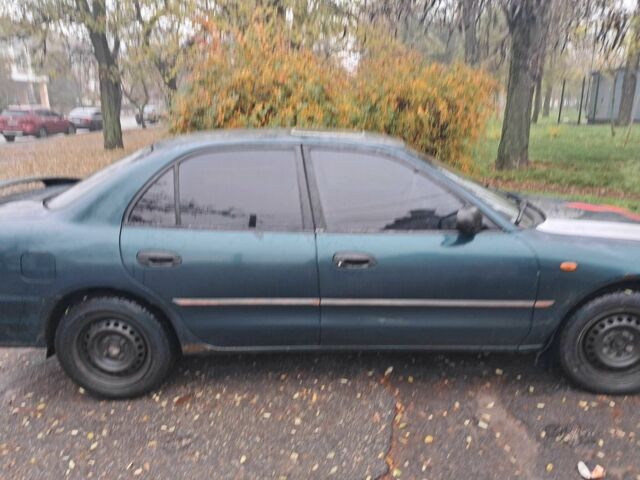 Зеленый Мицубиси Галант, объемом двигателя 2 л и пробегом 280 тыс. км за 1450 $, фото 3 на Automoto.ua