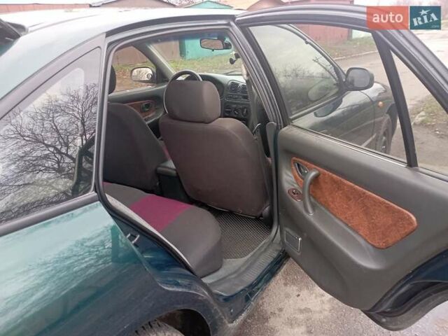 Зеленый Мицубиси Галант, объемом двигателя 1.83 л и пробегом 200 тыс. км за 3100 $, фото 13 на Automoto.ua