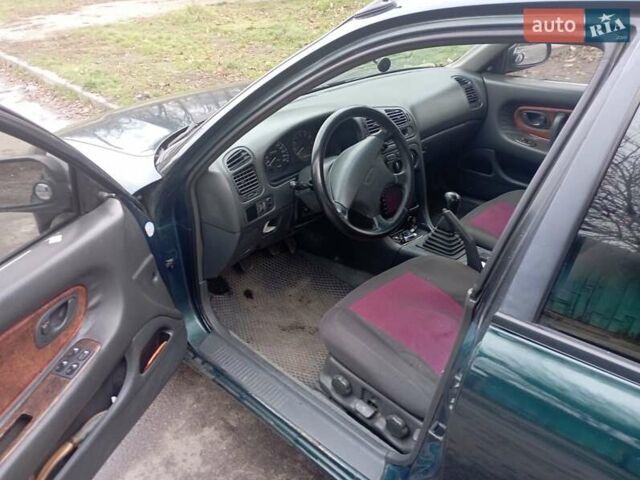 Зеленый Мицубиси Галант, объемом двигателя 1.83 л и пробегом 200 тыс. км за 3100 $, фото 3 на Automoto.ua