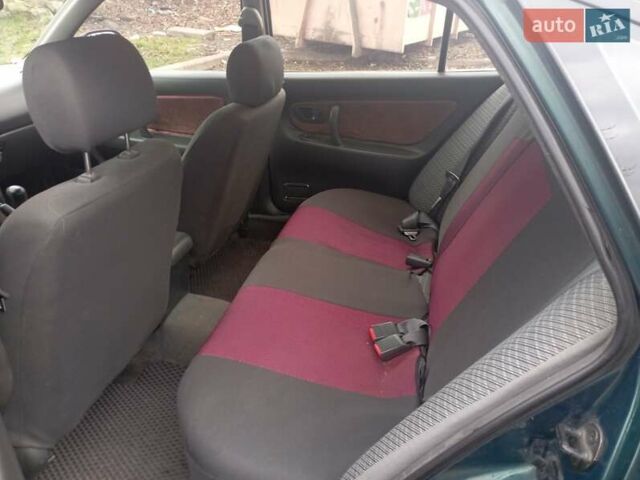 Зеленый Мицубиси Галант, объемом двигателя 1.83 л и пробегом 200 тыс. км за 3100 $, фото 9 на Automoto.ua