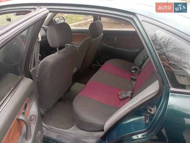 Зеленый Мицубиси Галант, объемом двигателя 1.83 л и пробегом 200 тыс. км за 3100 $, фото 4 на Automoto.ua