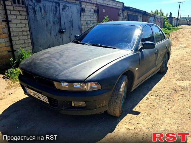 Зеленый Мицубиси Галант, объемом двигателя 2 л и пробегом 365 тыс. км за 3599 $, фото 1 на Automoto.ua