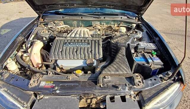 Зеленый Мицубиси Галант, объемом двигателя 2.5 л и пробегом 300 тыс. км за 3100 $, фото 12 на Automoto.ua
