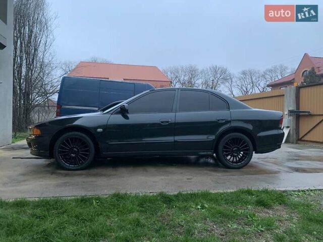 Зелений Міцубісі Галант, об'ємом двигуна 2 л та пробігом 197 тис. км за 4100 $, фото 5 на Automoto.ua