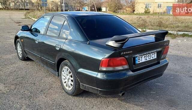 Зеленый Мицубиси Галант, объемом двигателя 2.5 л и пробегом 300 тыс. км за 3100 $, фото 3 на Automoto.ua